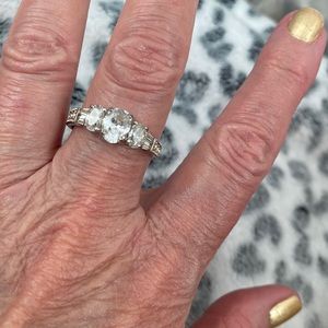 Avon silvertone with crystals ring